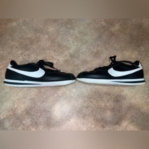 Nike Cortez sneakers.  Worn less than 5 times.  Don’t fit me